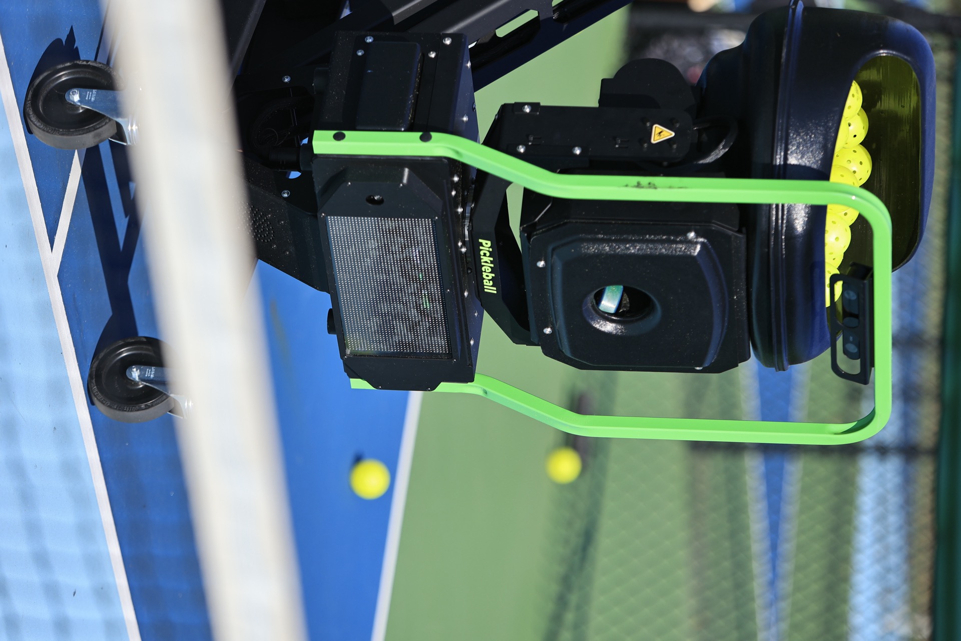 The Volley trainer face-on, on a pickleball court